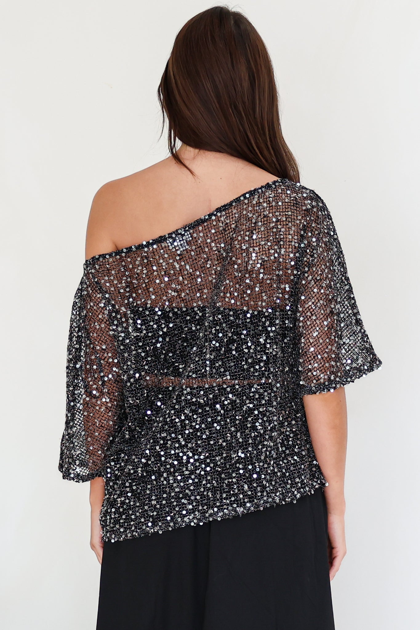 Janina Top - Off Shoulder Asymmetric Relaxed Sequin Mesh Top in Black