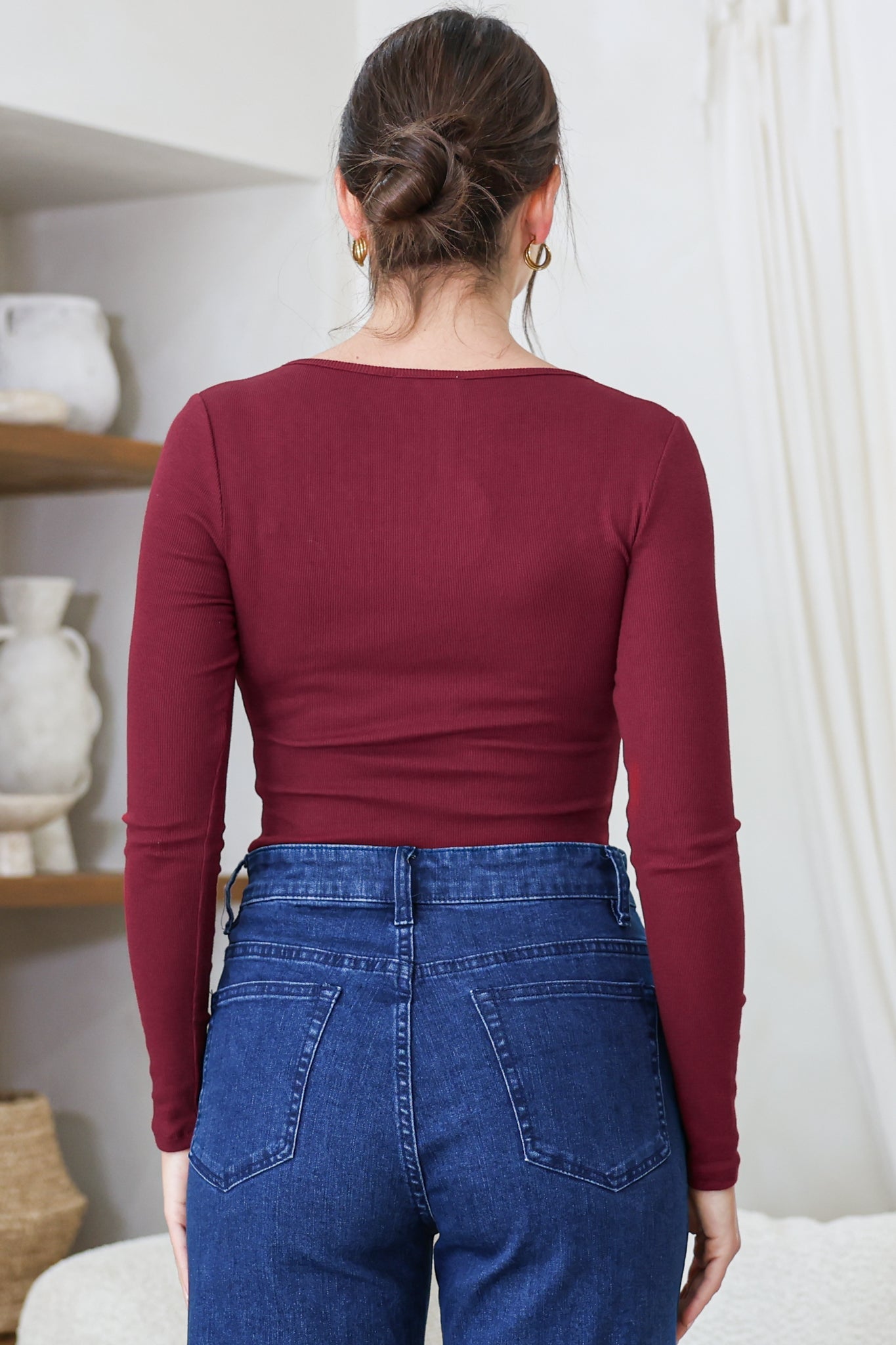 Roxana Top - Ribbed V Neck Long Sleeve Top with Gold Metal Accent in Wine