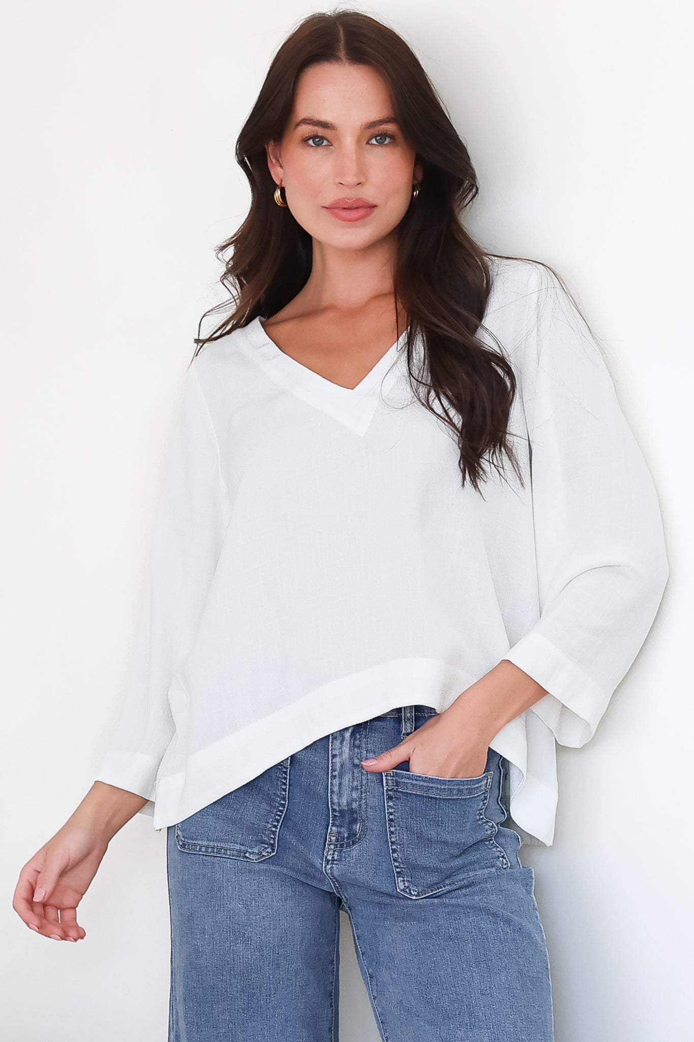 Breezer Top - Long Sleeve V Neck Pull Over Top with High Low Hemline in White