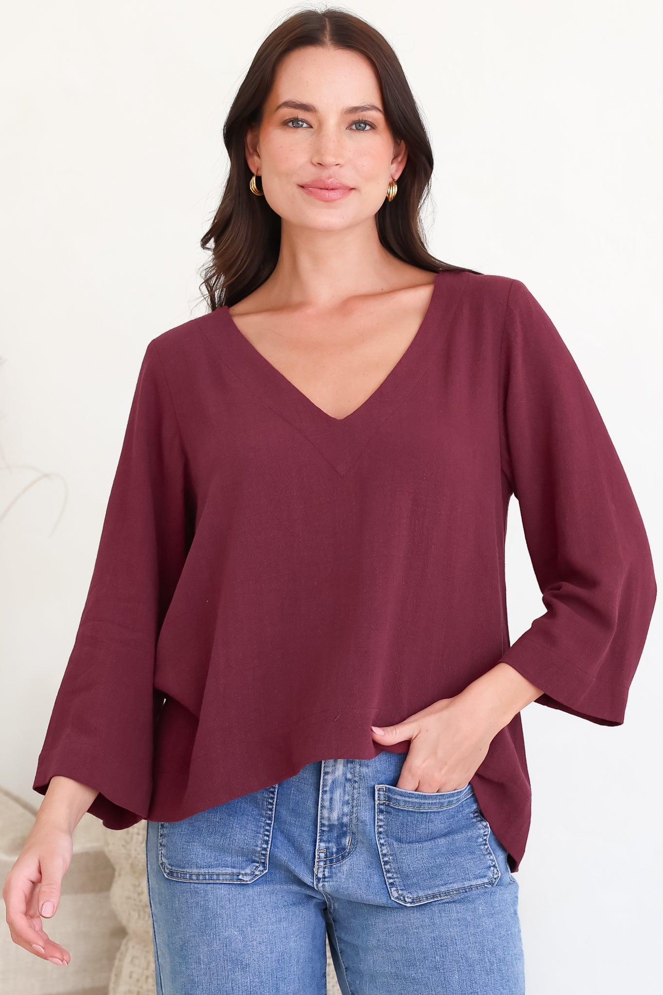Breezer Top - Long Sleeve V Neck Pull Over Top with High Low Hemline in Wine