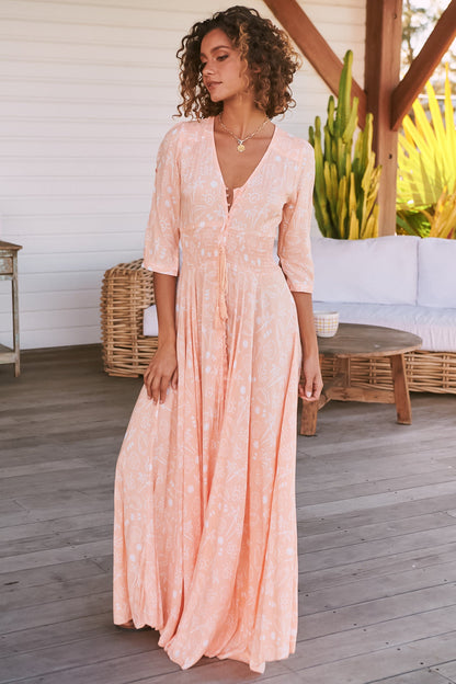 JAASE - Indiana Maxi Dress: Lace Back Shirred Waist A Line Dress with Handkerchief Hemline in Peach Island Print