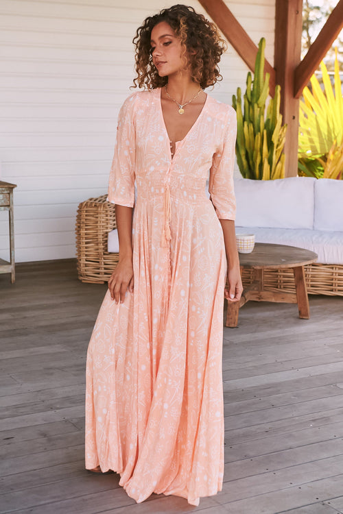 JAASE - Indiana Maxi Dress: Lace Back Shirred Waist A Line Dress with Handkerchief Hemline in Peach Island Print