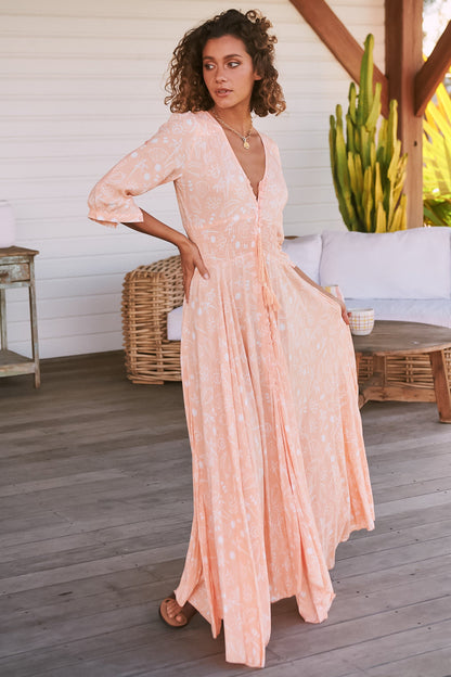 JAASE - Indiana Maxi Dress: Lace Back Shirred Waist A Line Dress with Handkerchief Hemline in Peach Island Print