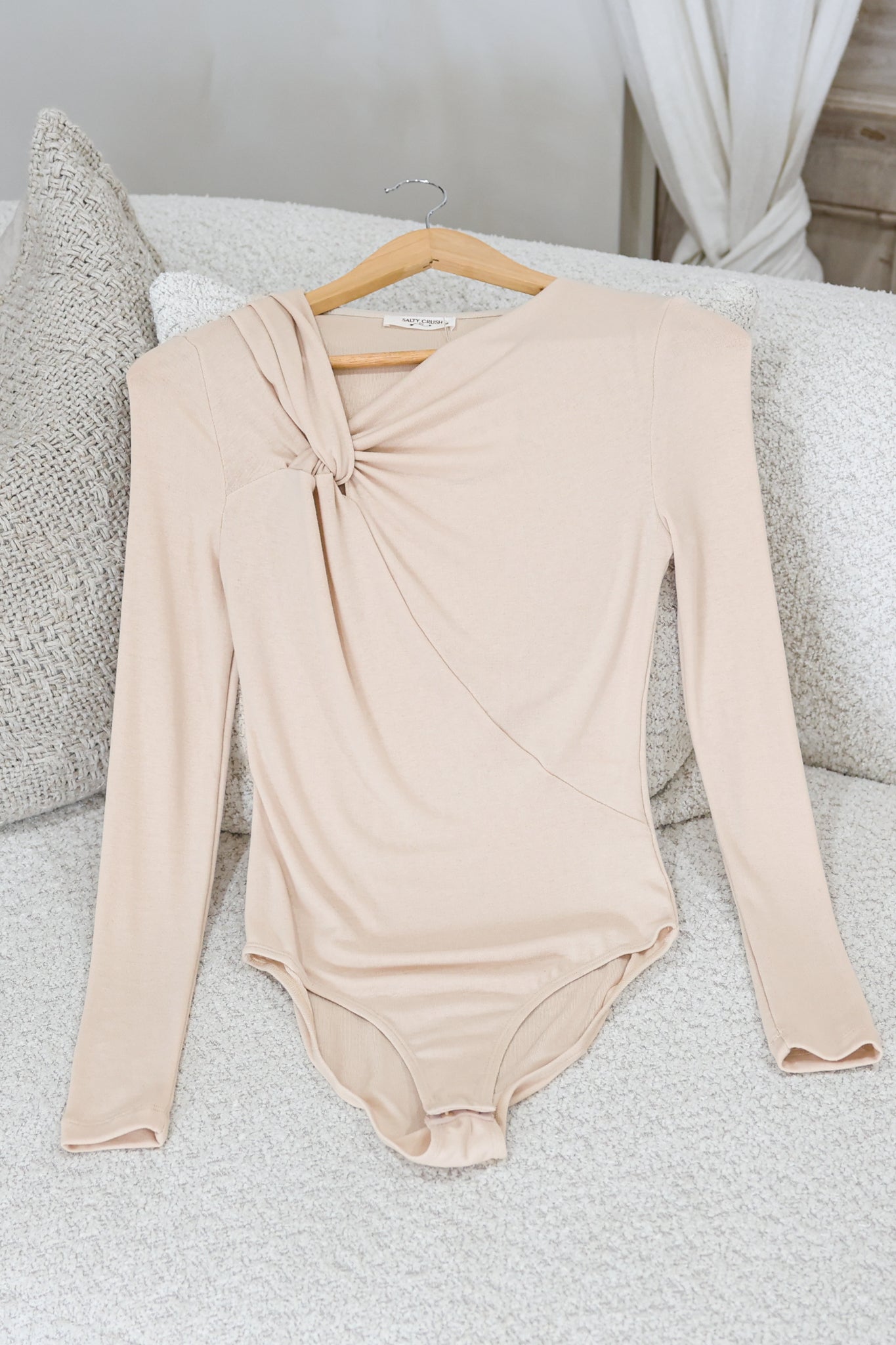 Jessica Bodysuit - Asymmetric Tie Knot Neckline and Push Button Closure in Cream