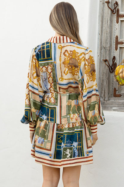 Morso Mini Dress - Wing Collar Front Button Placket Tiered Hem with Balloon Sleeves and String Belt in Regalia Print
