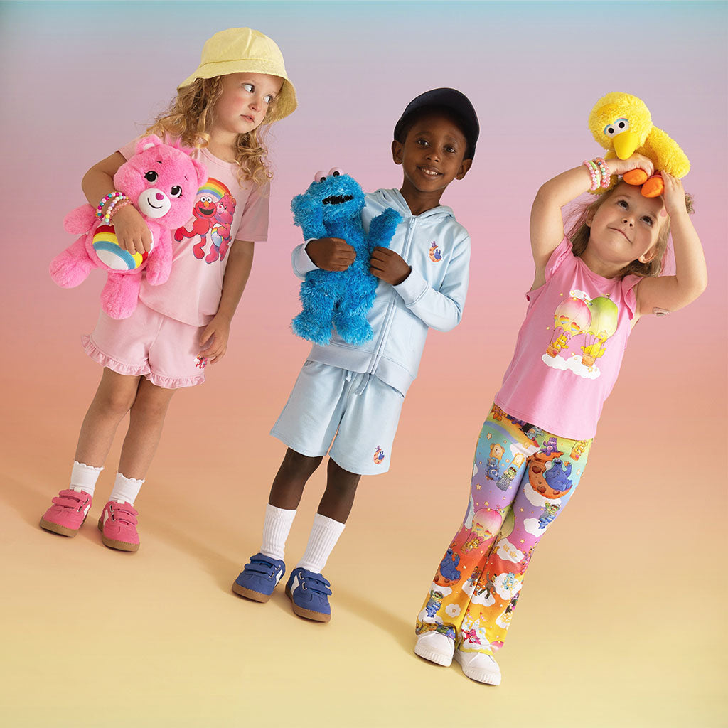 Care Bears™ Cheer Friends French Terry Graphic Ruffled Shorts