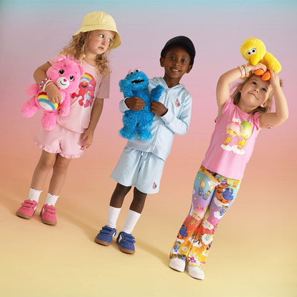 Care Bears™ Cheer Friends French Terry Graphic Ruffled Shorts