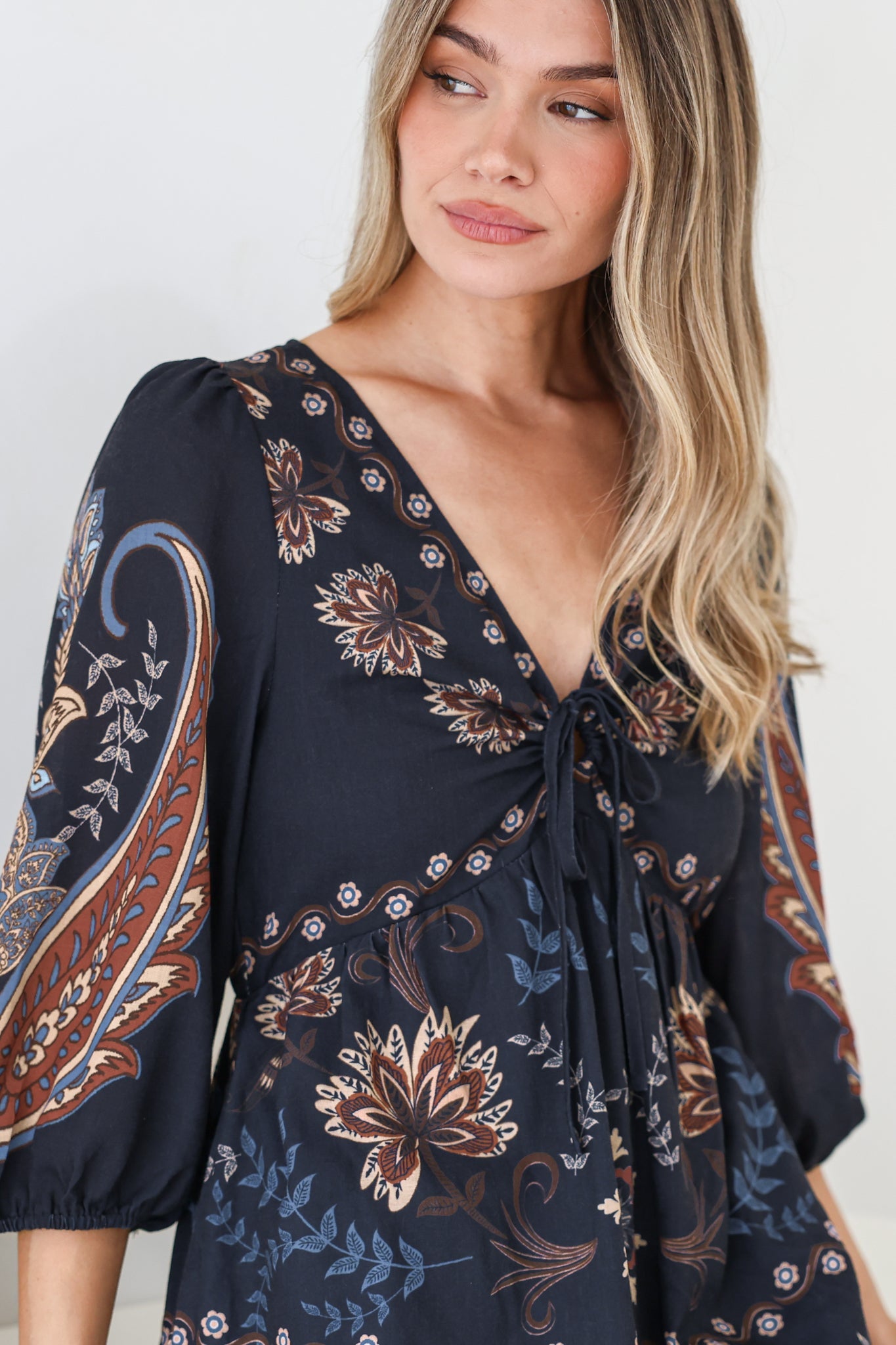 Thanya Midi Dress - V-Neck with Tie Balloon Sleeve Tiered Dress in Magah Print Navy