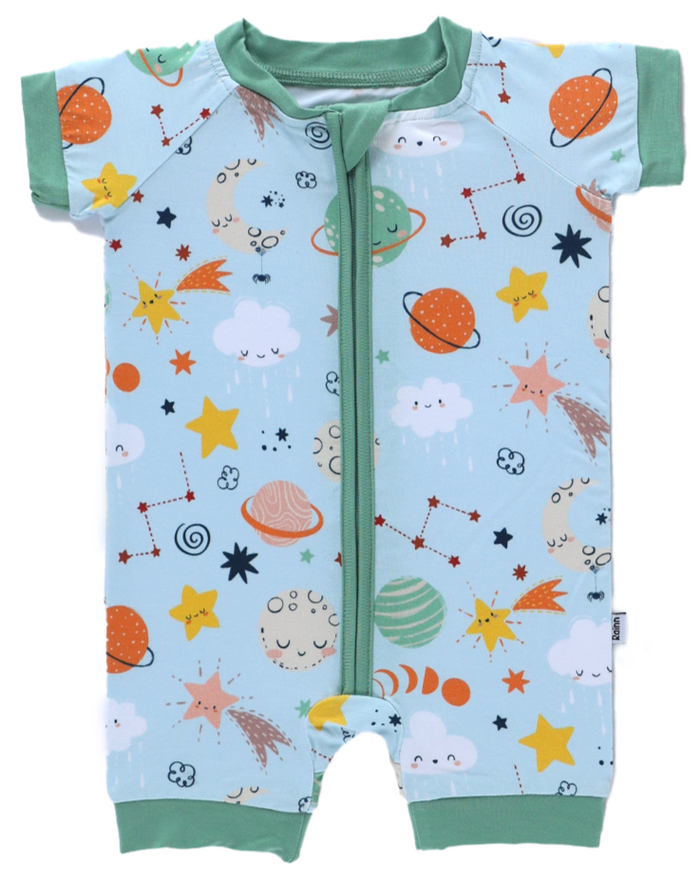 Cosmic Short Zipp Romper by Rainn, featuring playful space prints on soft bamboo fabric.
