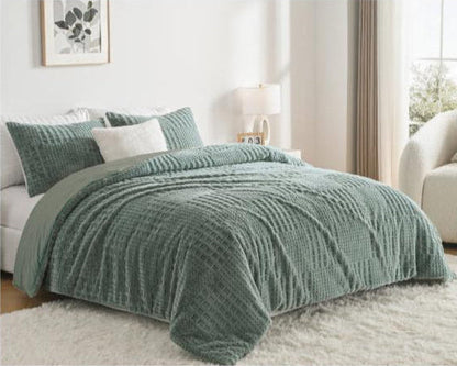 Green textured comforter on a bed in a bedroom with Megatex branding.
